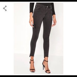 Black mid rise distressed jeans